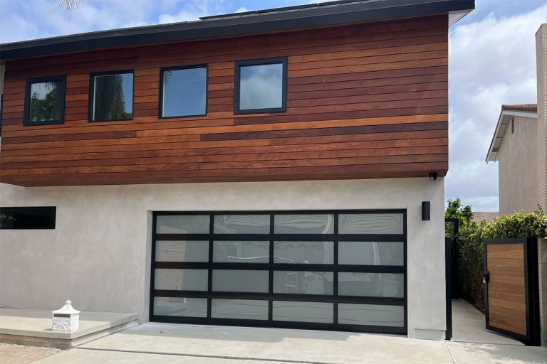 Modern Cerritos CA home remodel with C.H.I. Fullview glass garage door model 3295 black with frosted windows