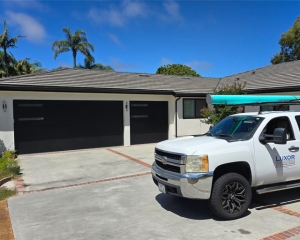 Skyline Flush garage door with two custom stacked windows in Rolling Hills Estates, CA.